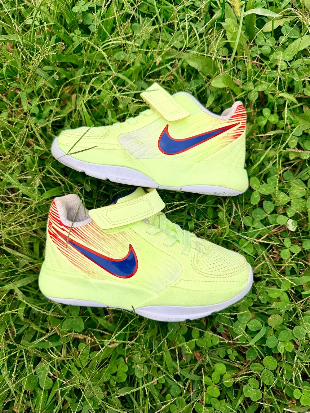 Nike Kids' Neon Green Basketball Sneakers with Blue and Red Accents